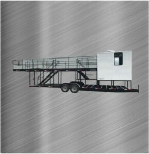 custom trailer with white steel observation cab installed with steps and black catwalk on stainless steel background