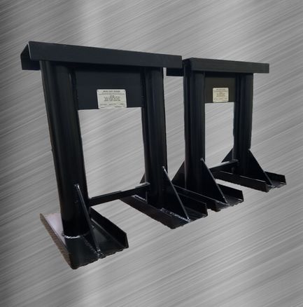 Black stationary equipment stands manufactured at CRA on a stainless steel background